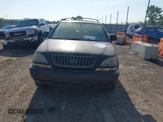 1999 Lexus RX 300 z VIN JT6HF10U4X0013913, wystawiony jako IAAI lot #42410496 z przebiegiem 282 583 mil mil oraz . Historia ofert i sprzedaży dostępna na DreamBid. Obrazek 6.