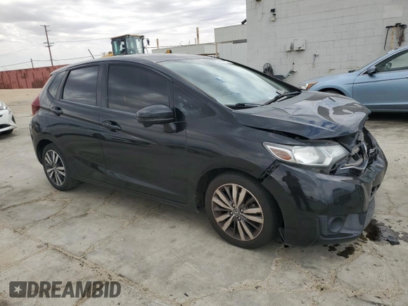 2015 Honda Fit EX-L with VIN 3HGGK5H86FM702976, listed as a Copart auction lot 59439045 with 164,932 mi miles and Salvage title. Bid and sale history available at DreamBid. Image 4.