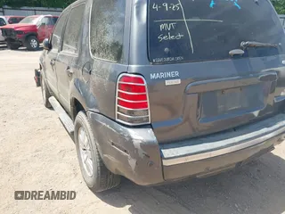 2005 Mercury Mariner Luxury with VIN 4M2CU57195DJ25103, listed as a IAAI auction lot 42032296 with 154,134 mi miles and . Bid and sale history available at DreamBid. Image 6.