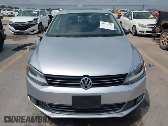 2012 Volkswagen Jetta TDI w/Premium & Nav with VIN 3VWLL7AJXCM359181, listed as a IAAI auction lot 42110771 with 148,547 mi miles and . Bid and sale history available at DreamBid. Image 13.