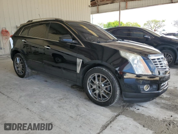 2015 Cadillac SRX Premium Collection with VIN 3GYFNDE38FS596718, listed as a Copart auction lot 56674245 with 106,379 mi miles and Salvage title. Bid and sale history available at DreamBid. Image 4.