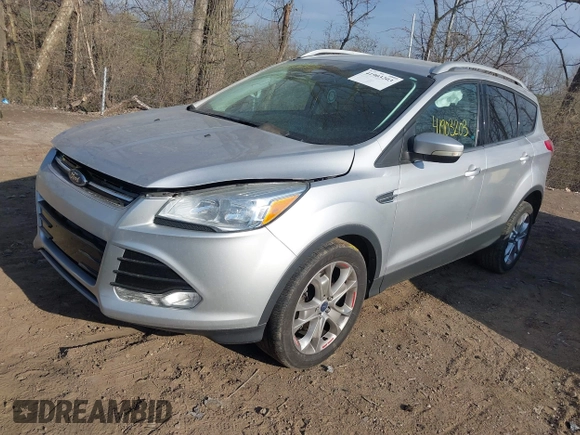2015 Ford Escape Titanium z VIN 1FMCU0J91FUC41531, wystawiony jako IAAI lot #41903203 z przebiegiem 118 962 mil mil oraz . Historia ofert i sprzedaży dostępna na DreamBid. Obrazek 17.
