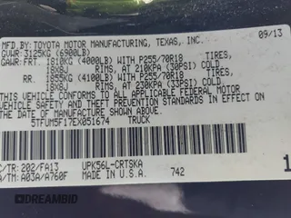 2014 Toyota Tundra 4WD Truck SR with VIN 5TFUM5F17EX051674, listed as a IAAI auction lot 41296906 with 140,782 mi miles. Bid and sale history available at carsss.com. Image 9.
