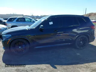 2019 BMW X5 xDrive50i with VIN 5UXJU2C5XKLN66873, listed as a IAAI auction lot 41472246 with 98,571 mi miles. Bid and sale history available at carsss.com. Image 13.