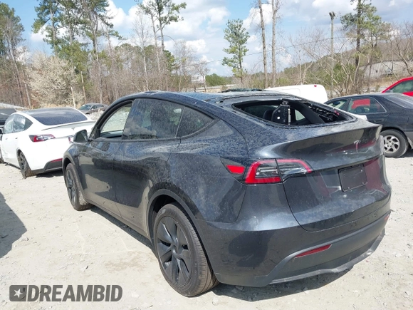2025 Tesla Model Y Long Range with VIN 7SAYGDED3SA352138, listed as a IAAI auction lot 41760798 with 1,209 mi miles and . Bid and sale history available at DreamBid. Image 13.