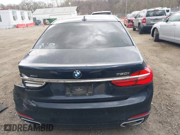2016 BMW 7 Series 750i xDrive with VIN WBA7F2C58GG418482, listed as a IAAI auction lot 41931831 with 97,776 mi miles and . Bid and sale history available at DreamBid. Image 15.