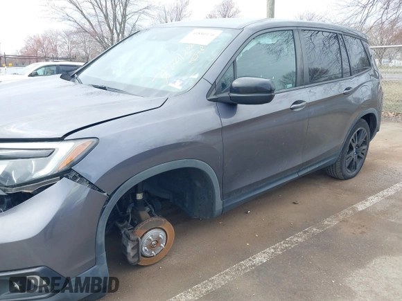 2019 Honda Passport Sport with VIN 5FNYF8H22KB012323, listed as a IAAI auction lot 41880476 with 153,341 mi miles and . Bid and sale history available at carsss.com. Image 18.