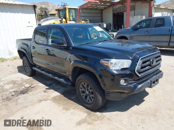 2023 Toyota Tacoma SR with VIN 3TMCZ5AN1PM654572, listed as a IAAI auction lot 42312575 with 14,111 mi miles and . Bid and sale history available at DreamBid. Image 1.
