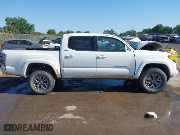 2017 Toyota Tacoma SR5 with VIN 5TFAZ5CNXHX044976, listed as a IAAI auction lot 42052922 with 149,116 mi miles and . Bid and sale history available at DreamBid. Image 13.