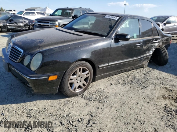 2001 Mercedes-Benz E-Class AWD with VIN WDBJF82JX1X044733, listed as a Copart auction lot 74825034 with 153,046 mi miles and Salvage Title. Bid and sale history available at carsss.com. Image 1.