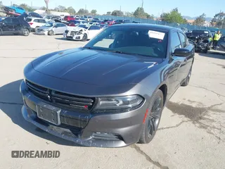 2016 Dodge Charger SXT with VIN 2C3CDXHG6GH327461, listed as a IAAI auction lot 41955412 with 124,775 mi miles and . Bid and sale history available at carsss.com. Image 2.
