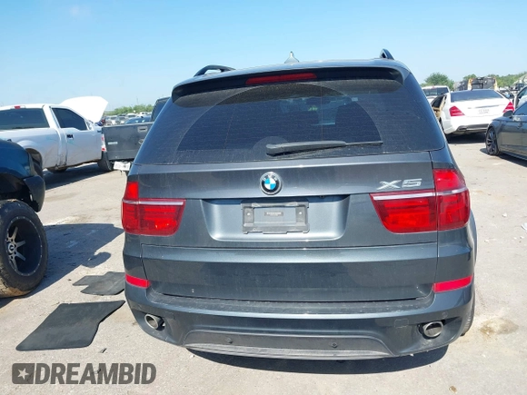 2012 BMW X5 35d with VIN 5UXZW0C51CL669957, listed as a IAAI auction lot 42230292 with 102,305 mi miles and . Bid and sale history available at DreamBid. Image 16.