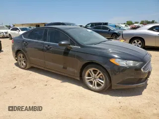 2018 Ford Fusion SE z VIN 3FA6P0HD5JR252718, wystawiony jako Copart lot #60549335 z przebiegiem 120 807 mil mil oraz Czysty tytuł • Clean title. Historia ofert i sprzedaży dostępna na DreamBid. Obrazek 4.