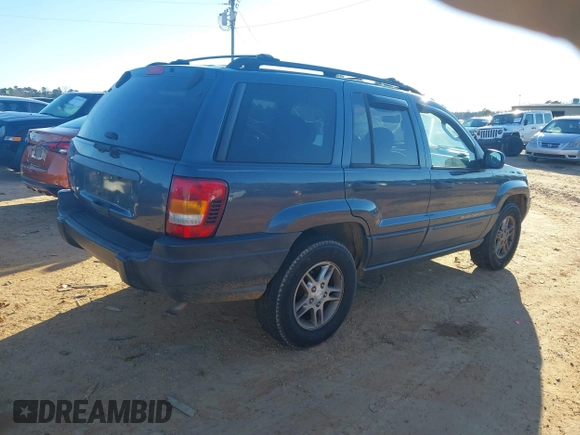 2004 Jeep Grand Cherokee Laredo z VIN 1J4GW48S24C159370, wystawiony jako IAAI lot #41296094 z przebiegiem 138 296 mil mil oraz . Historia ofert i sprzedaży dostępna na DreamBid. Obrazek 4.