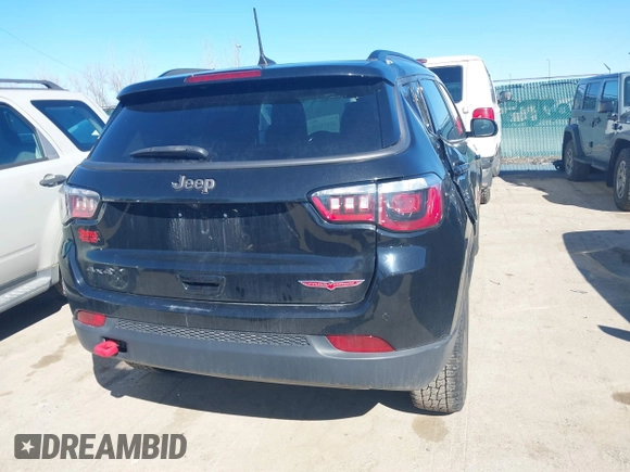 2019 Jeep Compass Trailhawk with VIN 3C4NJDDB1KT671642, listed as a IAAI auction lot 41810138 with 119,029 mi miles and . Bid and sale history available at carsss.com. Image 16.