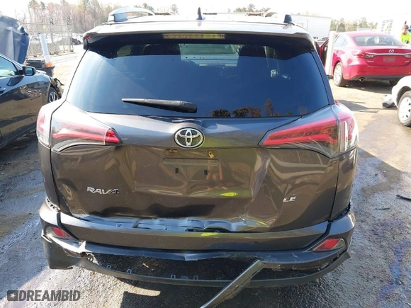 2016 Toyota RAV4 LE with VIN 2T3ZFREV7GW305998, listed as a IAAI auction lot 41869024 with 163,463 mi miles. Bid and sale history available at carsss.com. Image 16.