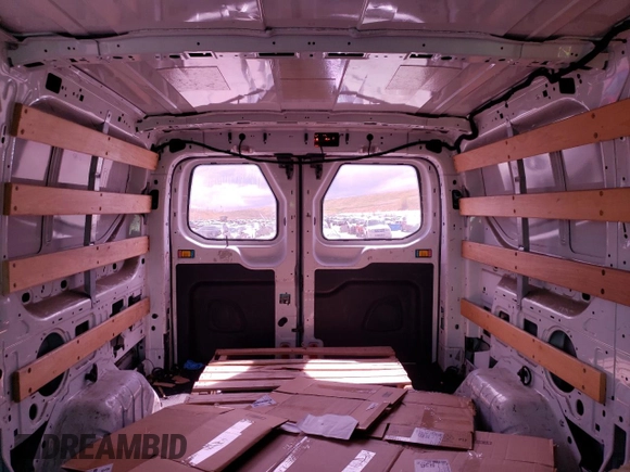 2016 Ford Transit Cargo z VIN 1FTYR1ZM4GKA23204, wystawiony jako Copart lot #55861645 z przebiegiem 222 430 mil mil oraz Szkoda całkowita • Salvage title. Historia ofert i sprzedaży dostępna na DreamBid. Obrazek 10.