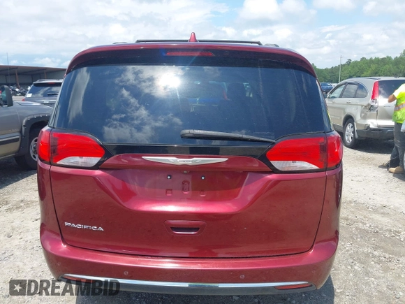 2017 Chrysler Pacifica Touring L with VIN 2C4RC1BG0HR591124, listed as a IAAI auction lot 42138595 with 113,071 mi miles and . Bid and sale history available at DreamBid. Image 17.