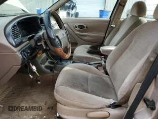 1998 Ford Contour SE z VIN 1FAFP6637WK280190, wystawiony jako Copart lot #84331424 z przebiegiem 185 754 mil mil oraz Czysty tytuł • Clean title. Historia ofert i sprzedaży dostępna na DreamBid. Obrazek 7.