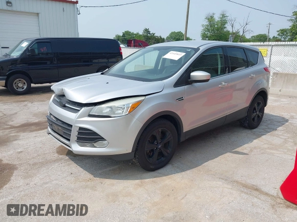 2014 Ford Escape SE with VIN 1FMCU9GX9EUD83148, listed as a IAAI auction lot 42449815 with 120,062 mi miles and . Bid and sale history available at DreamBid. Image 17.