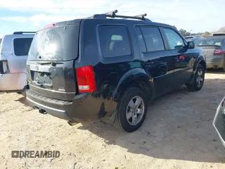 2011 Honda Pilot EX-L with VIN 5FNYF4H65BB053914, listed as a IAAI auction lot 41599171 with 230,186 mi miles and . Bid and sale history available at carsss.com. Image 4.