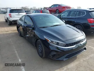2023 Kia Forte LXS with VIN 3KPF24AD9PE551672, listed as a IAAI auction lot 41794626 with 24,257 mi miles and . Bid and sale history available at carsss.com. Image 1.