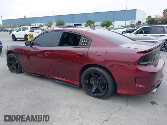 2019 Dodge Charger R/T with VIN 2C3CDXCT2KH749207, listed as a IAAI auction lot 42120658 with 52,330 mi miles and . Bid and sale history available at carsss.com. Image 3.