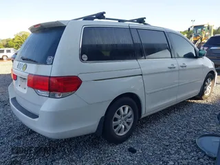 2009 Honda Odyssey EX-L with VIN 5FNRL38799B404379, listed as a IAAI auction lot 41990398 with 224,859 mi miles. Bid and sale history available at carsss.com. Image 4.