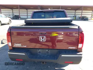 2019 Honda Ridgeline RTL-E with VIN 5FPYK3F72KB024461, listed as a IAAI auction lot 41813568 with 122,364 mi miles and . Bid and sale history available at DreamBid. Image 15.