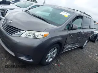 2014 Toyota Sienna LE AAS with VIN 5TDKK3DC3ES506466, listed as a IAAI auction lot 41908023 with 118,297 mi miles and . Bid and sale history available at carsss.com. Image 2.
