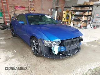 2024 Ford Mustang EcoBoost with VIN 1FA6P8TH8R5121614, listed as a IAAI auction lot 42222704 with 16,443 mi miles and . Bid and sale history available at DreamBid. Image 1.