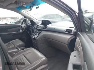 2011 Honda Odyssey EX-L with VIN 5FNRL5H61BB072124, listed as a IAAI auction lot 42115299 with 155,086 mi miles and . Bid and sale history available at DreamBid. Image 5.