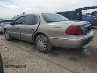 2001 Lincoln Continental with VIN 1LNHM97V71Y711366, listed as a Copart auction lot 75245564 with 0 mi miles and Non Repairable. Bid and sale history available at carsss.com. Image 2.