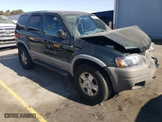 2002 Ford Escape Limited with VIN 1FMCU04162KA51672, listed as a Copart auction lot 74035414 with 140,752 mi miles and Salvage Title. Bid and sale history available at carsss.com. Image 4.