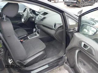 2015 Ford Fiesta SE with VIN 3FADP4BJ5FM130099, listed as a IAAI auction lot 42126960 with 82,299 mi miles and . Bid and sale history available at DreamBid. Image 5.