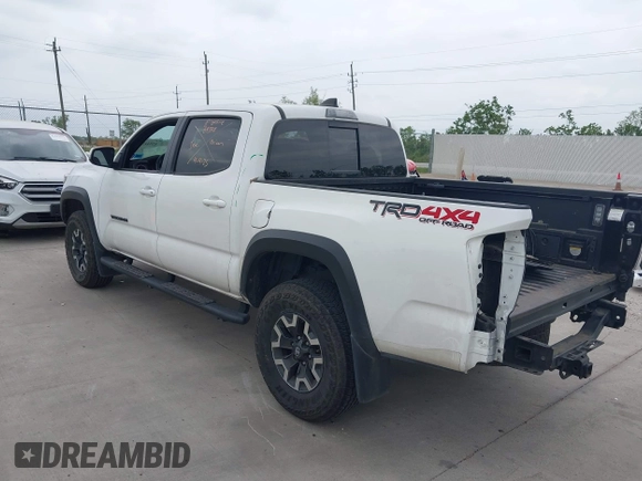 2022 Toyota Tacoma SR z VIN 3TMCZ5AN7NM493268, wystawiony jako IAAI lot #42041593 z przebiegiem 100 589 mil mil oraz . Historia ofert i sprzedaży dostępna na DreamBid. Obrazek 3.