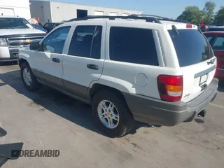 2002 Jeep Grand Cherokee Laredo with VIN 1J4GW48S22C131470, listed as a IAAI auction lot 42599375 with 200,815 mi miles and . Bid and sale history available at DreamBid. Image 3.