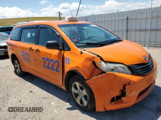 2014 Toyota Sienna L with VIN 5TDZK3DC1ES415890, listed as a Copart auction lot 62812484 with 270,286 mi miles and Salvage Title. Bid and sale history available at carsss.com. Image 4.