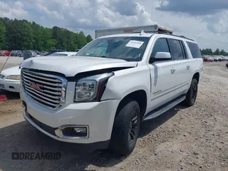 2017 GMC Yukon XL SLT z VIN 1GKS2GKC5HR160468, wystawiony jako IAAI lot #42166908 z przebiegiem 131 469 mil mil oraz . Historia ofert i sprzedaży dostępna na DreamBid. Obrazek 2.
