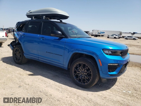 2023 Jeep Grand Cherokee Summit Reserve with VIN 1C4RJYE60P8881133, listed as a Copart auction lot 52354915 with 31,739 mi miles and Salvage title. Bid and sale history available at DreamBid. Image 4.