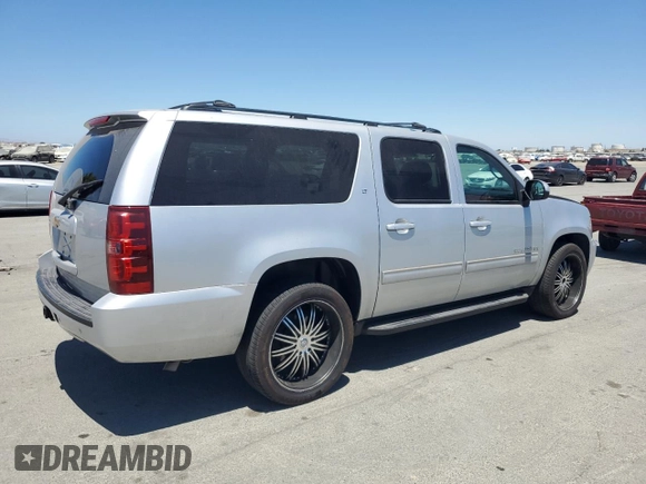 2013 Chevrolet Suburban LT with VIN 1GNSCJE09DR105725, listed as a Copart auction lot 61450935 with 171,659 mi miles and Salvage title. Bid and sale history available at DreamBid. Image 3.