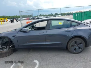 2023 Tesla Model 3 z VIN 5YJ3E1EA1PF449575, wystawiony jako IAAI lot #42457119 z przebiegiem 51 084 mil mil oraz . Historia ofert i sprzedaży dostępna na DreamBid. Obrazek 14.