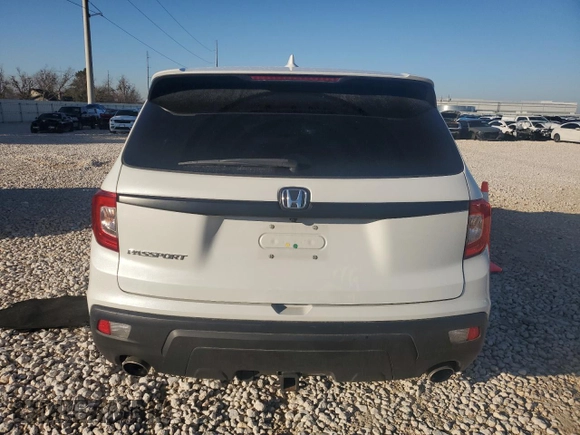 2021 Honda Passport EX-L with VIN 5FNYF7H56MB015412, listed as a Copart auction lot 85828114 with 39,334 mi miles and Salvage Title. Bid and sale history available at carsss.com. Image 6.
