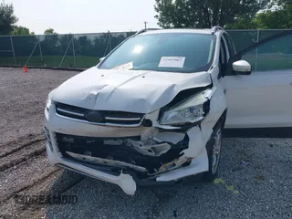 2015 Ford Escape Titanium with VIN 1FMCU0JXXFUA07175, listed as a IAAI auction lot 42447067 with 94,893 mi miles and . Bid and sale history available at DreamBid. Image 6.