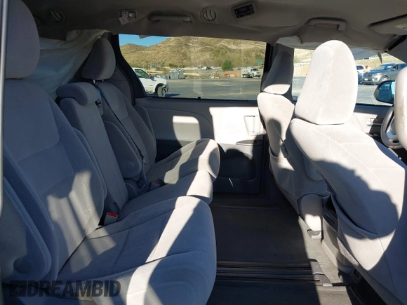 2015 Toyota Sienna LE AAS with VIN 5TDKK3DC3FS529845, listed as a IAAI auction lot 41627102 with 130,334 mi miles. Bid and sale history available at carsss.com. Image 8.