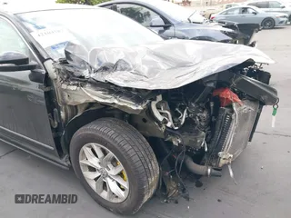 2016 Volkswagen Passat S with VIN 1VWAT7A30GC053798, listed as a IAAI auction lot 42104287 with 58,641 mi miles and . Bid and sale history available at DreamBid. Image 19.