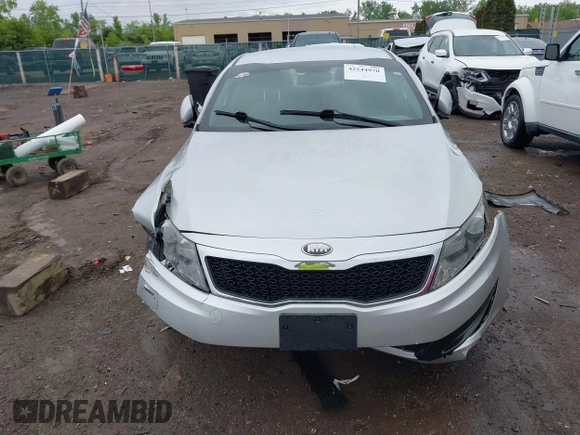 2013 Kia Optima LX z VIN KNAGM4A75D5431221, wystawiony jako IAAI lot #42244970 z przebiegiem 138 157 mil mil oraz . Historia ofert i sprzedaży dostępna na DreamBid. Obrazek 13.