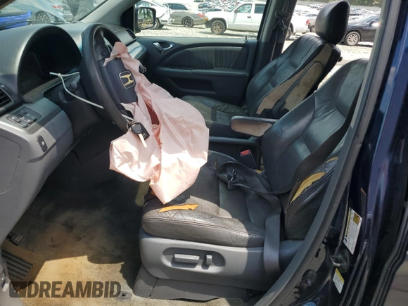 2005 Honda Odyssey EX-L z VIN 5FNRL38775B014777, wystawiony jako Copart lot #56245735 z przebiegiem 222 798 mil mil oraz Szkoda całkowita • Salvage title. Historia ofert i sprzedaży dostępna na DreamBid. Obrazek 7.