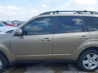 2009 Subaru Forester X Limited z VIN JF2SH64699H745428, wystawiony jako IAAI lot #42407890 z przebiegiem 131 716 mil mil oraz . Historia ofert i sprzedaży dostępna na DreamBid. Obrazek 14.