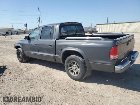 2003 Dodge Dakota SLT with VIN 1D7HL48X03S114761, listed as a Copart auction lot 52323405 with 137,105 mi miles and Salvage Title. Bid and sale history available at carsss.com. Image 2.